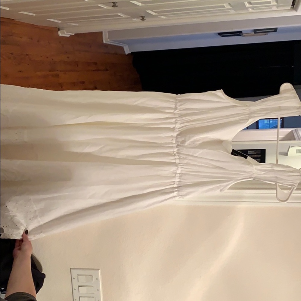 White below the knee dress